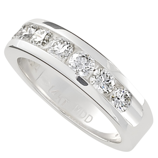 Lady's Tapered Seven Diamond Machine Set Ring